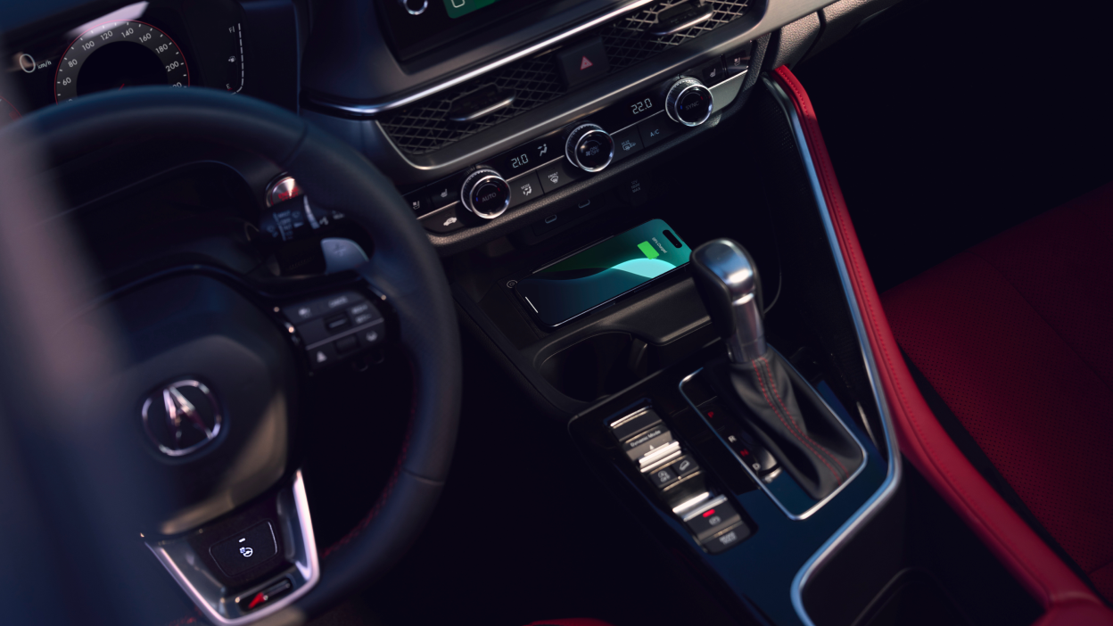 Close-up image of steering whel and dashboard. 