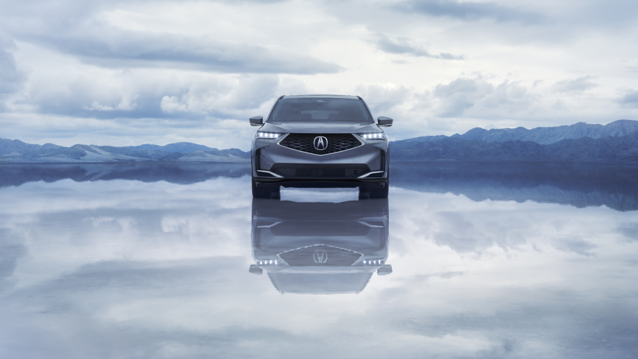 Side view of a purple MDX in a bright, stylish room