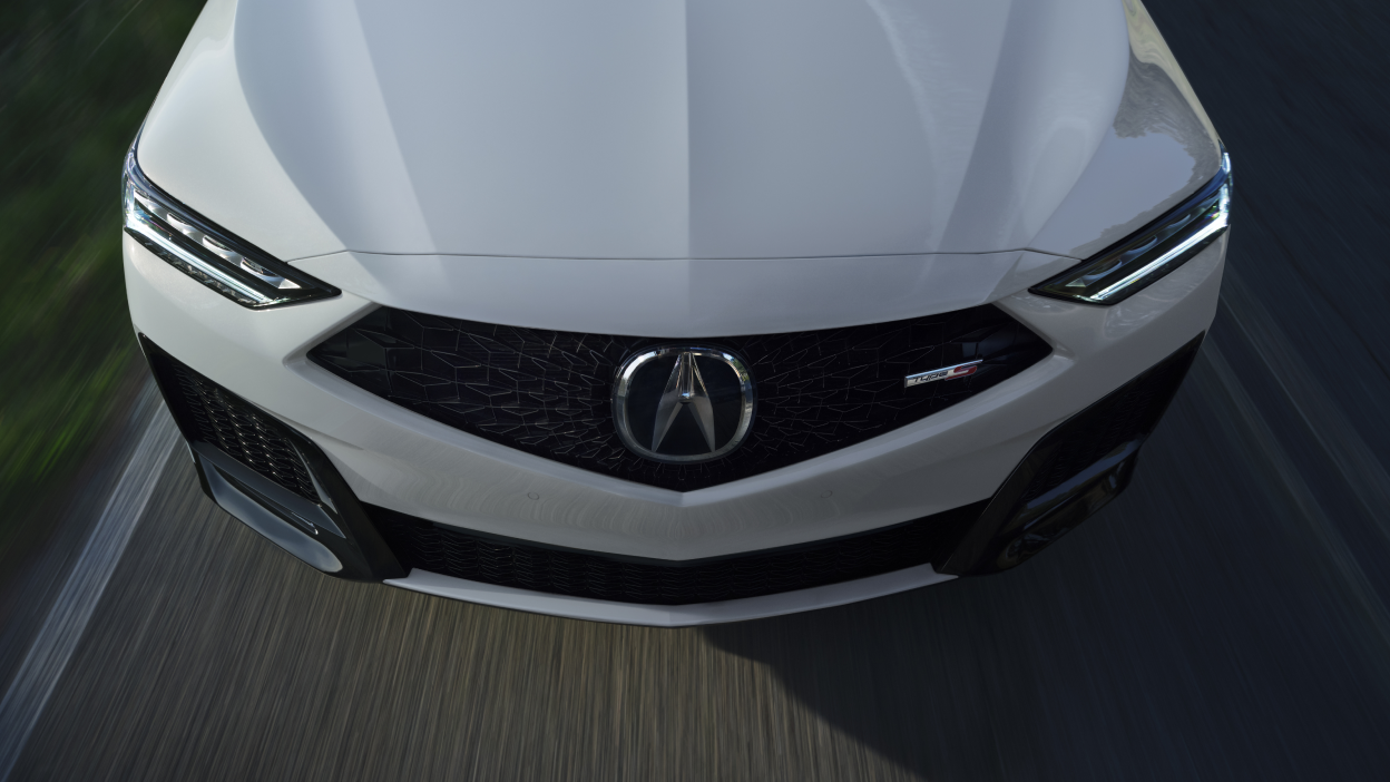 An overhead shot of the hood of a grey MDX.